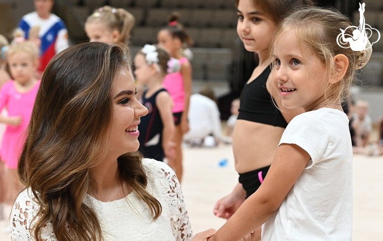 Olympic champion Alina Kabaeva with a young participant of the Academy selection process