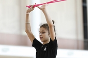 Karolina Tarasova during an exercise with a rope at a training session