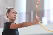 Maria Pobedushkina during a hoop exercise