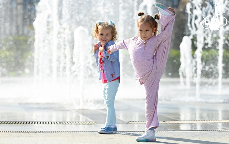 Girls at the Academy fountain