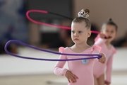 Young gymnasts during an exercise with  jump ropes