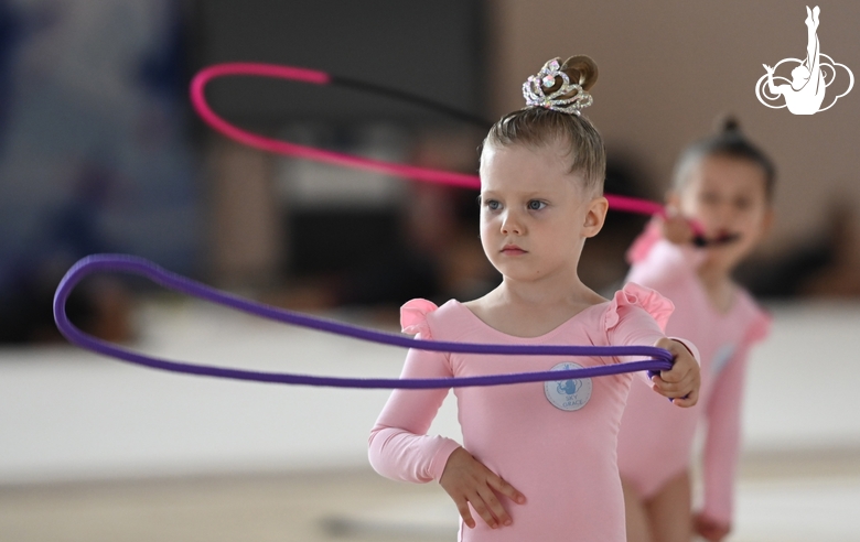 Young gymnasts during an exercise with  jump ropes