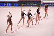 Gymnasts during an exercise with balls and ribbons