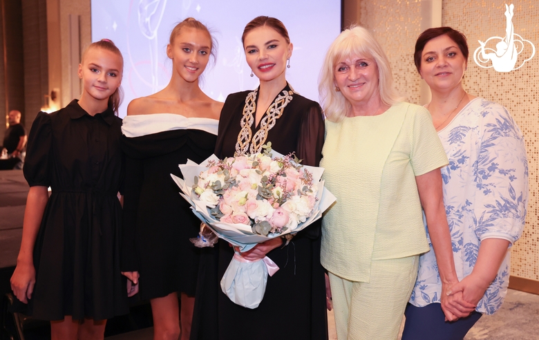 Olympic champion Alina Kabaeva, Adelina Nizamutdinova, Victoria Bespalova, coaches Tatyana Gribkova and Natalya Simashkevich after the awards ceremony of the international Sky Grace Cup tournament in Doha