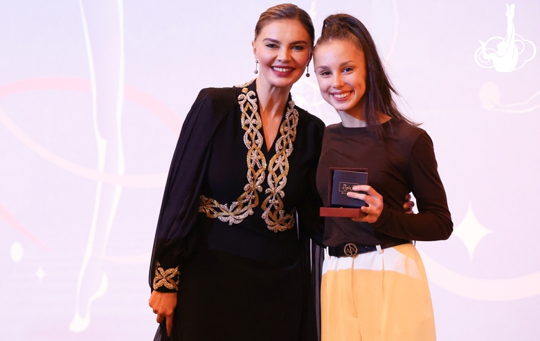 Olympic champion Alina Kabaeva and Mariia Borisova after the awards ceremony of the international Sky Grace Cup tournament in Doha