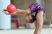 Ksenia Savinova does an exercise with a ball