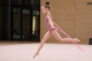 Young gymnast during the workout