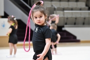 Young gymnast during training