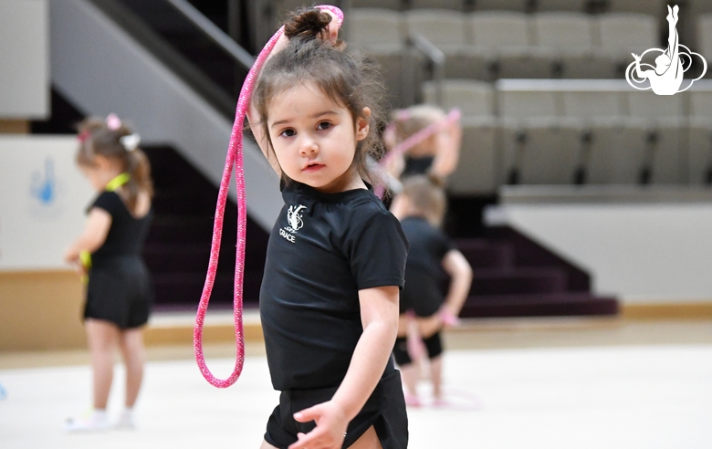 Young gymnast during training