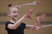 Kristina Voitenko during an exercise with clubs