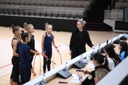 Academy group gymnasts and coach Anna Ustsova during a control training session before the Russian Championship