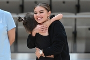 Olympic champion Alina Kabaeva with a young gymnast