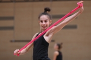 Gymnast during an exercise with a jump rope during floor testing