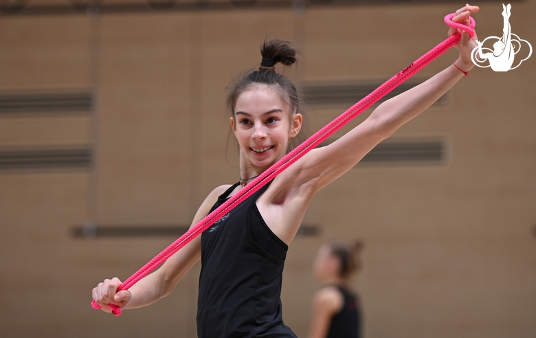 Gymnast during an exercise with a jump rope during floor testing