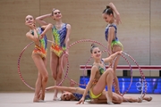 Gymnasts during an exercise with hoops