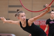 Gymnast during an exercise with a hoop during floor testing