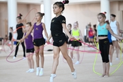 Gymnasts from the Amur Tiger society during an exercise with a jump rope