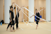 Academy group gymnasts during exercise with ribbons