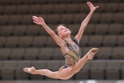 Sabina Samatova performs a split jump