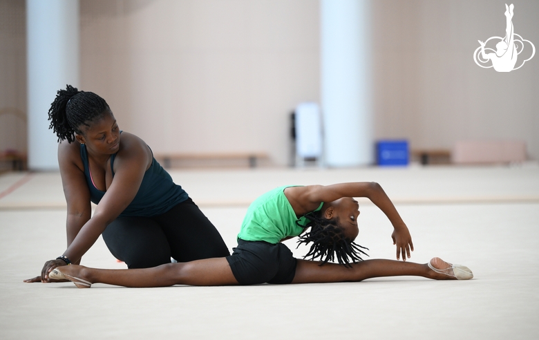 Gymnast from the Republic of Congo Nkenko Sita Davina Chanselvi together with coach Dominique Adama when stretching