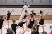 Academy choreographer Ekaterina Belova and Young gymnasts during rehearsal