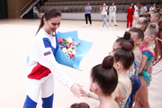 Olympic Champion Alina Kabaeva greets young gymnasts