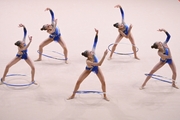 Gymnasts during an exercise with hoops