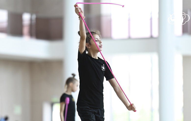 Karolina Tarasova during an exercise with a rope at a training session