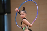 Ksenia Savinova during an exercise with a hoop at a control training session