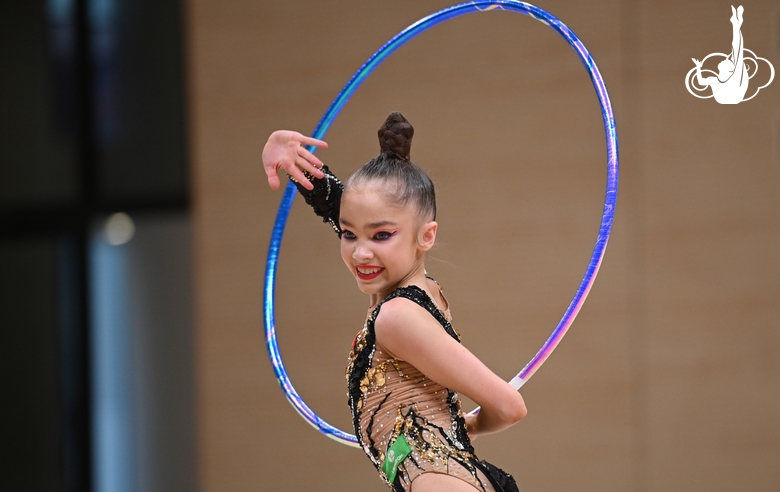 Ksenia Savinova during an exercise with a hoop at a control training session