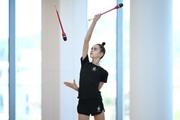 Anna Vakulenko during an exercise with clubs