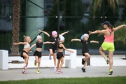 Academy coach Olesya Kovaleva and young gymnasts during training