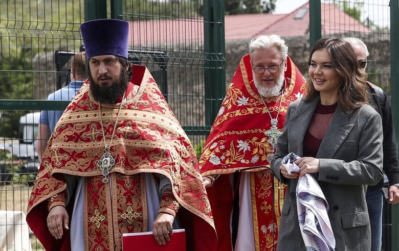 May 21, 2023. Feodosia. Priests meet Olympic champion Alina Kabaeva on the territory of the  Demetrius of Thessalonica church