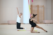 Coach Elizaveta Chernova and gymnast Aryaa Nitesh Kadam during training