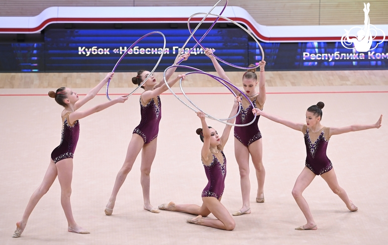 Gymnasts during an exercise with hoops