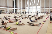 Gymnasts during class  on object preparation