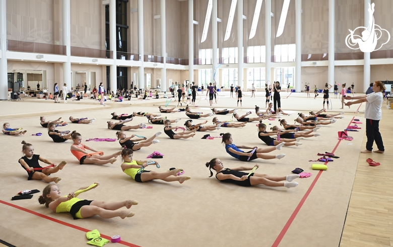 Gymnasts during class  on object preparation