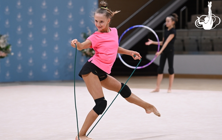 Gymnast during an exercise with a jump rope during floor testing