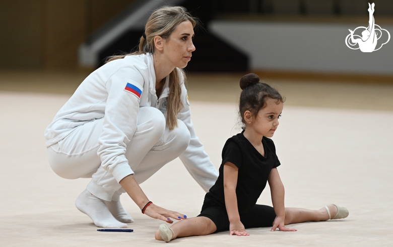 Academy Coach Olga Frolova with a young gymnast during the selection