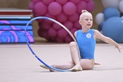 Young gymnast during an exercise with a hoop at the mAlinka tournament