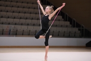 Gymnast during an exercise with a jump rope during floor testing