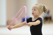 Young gymnast during training