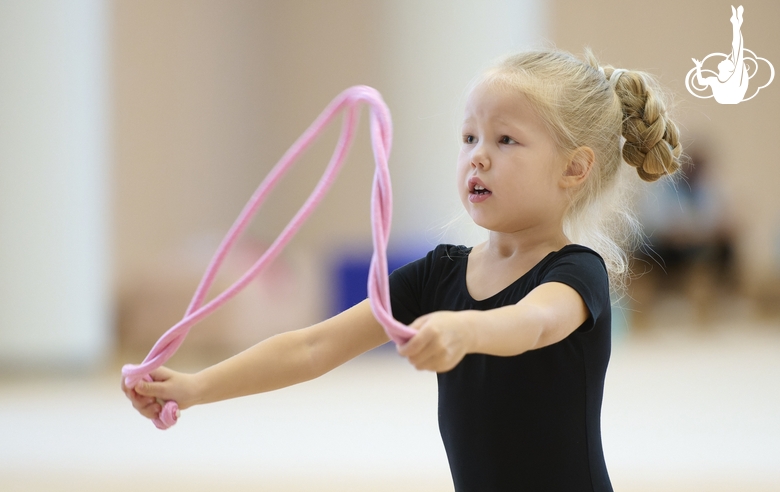 Young gymnast during training