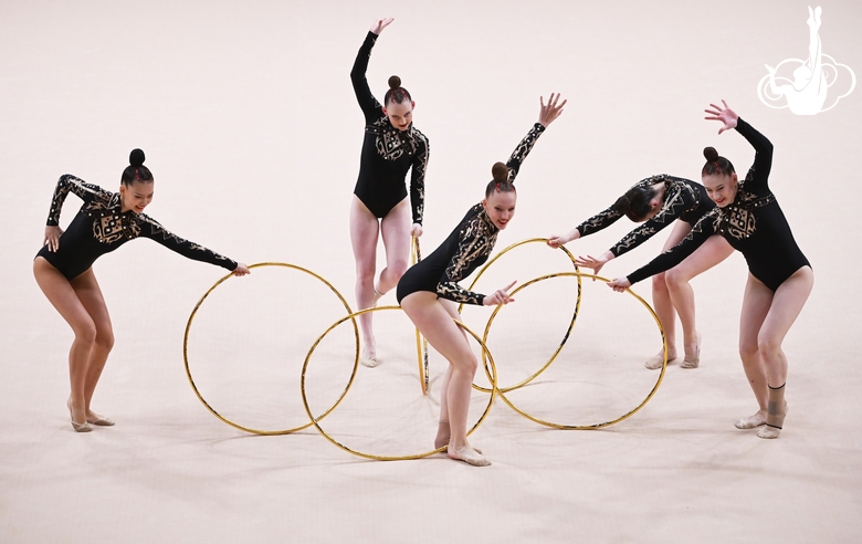 Gymnasts during an exercise with hoops