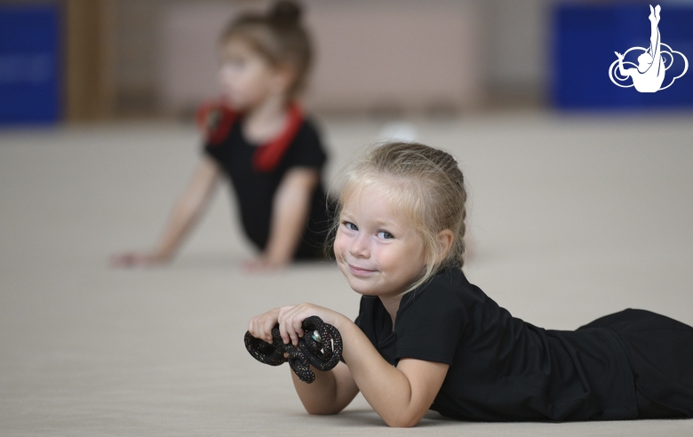 Young gymnast during training