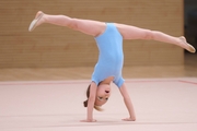 Young gymnast during the workout