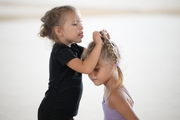 Young gymnasts during training