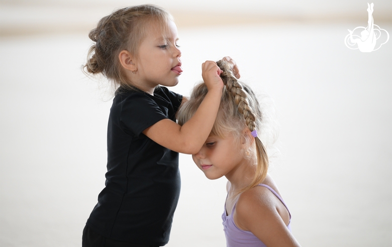 Young gymnasts during training