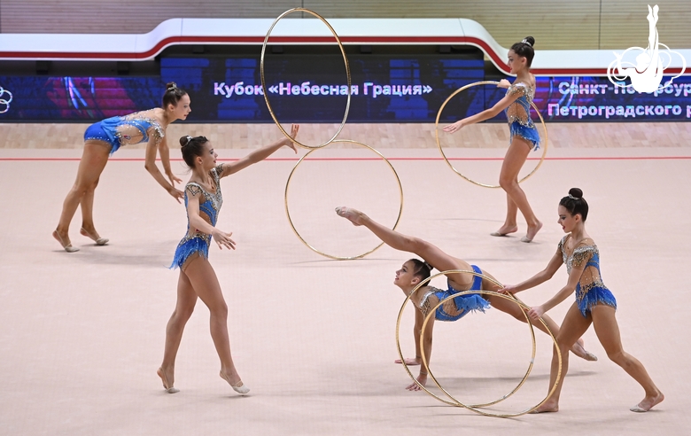 Gymnasts during an exercise with hoops