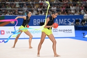 Gymnasts during the exercise with balls and ribbons